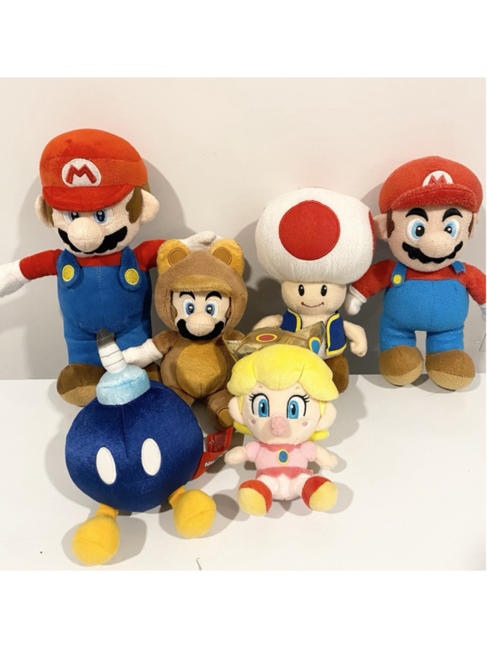 Nintendo Super Mario Plush Lot of 6 Tanooki Mario Toad Baby Peach Bob-omb